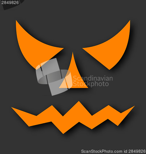 Image of Jack o lantern pumpkin faces glowing on black background