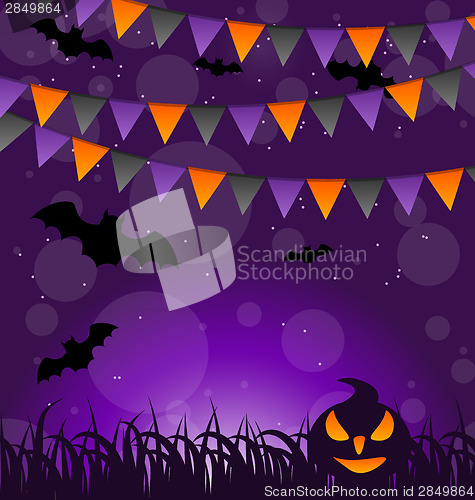 Image of Halloween background with pumpkins and hanging flags