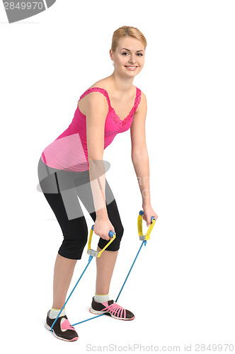 Image of Back extension exercise using rubber resistance band