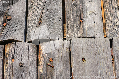Image of cracked aged wooden boards