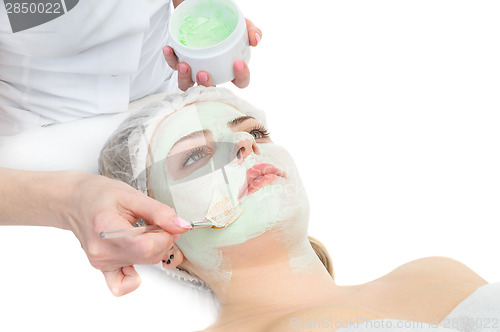 Image of beauty salon, facial mask applying