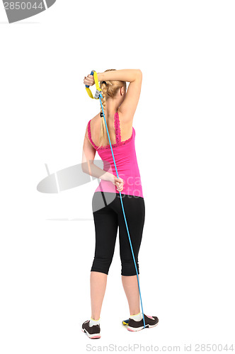 Image of Female triceps extention exercise using rubber resistance band