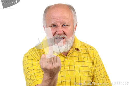 Image of senior bald man shows fuck or middle finger