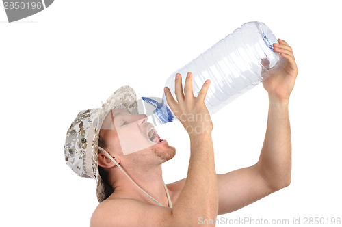 Image of young man drinks from empty bottle