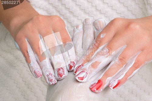 Image of Feet massage with cream