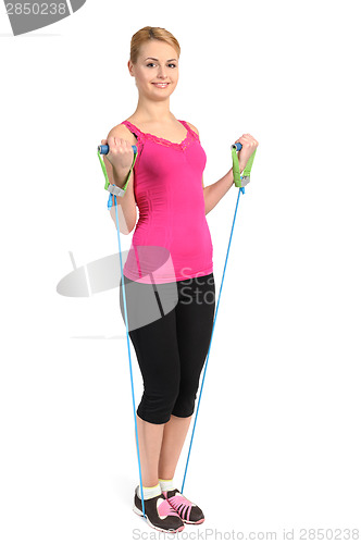 Image of Female biceps exercise using rubber resistance band