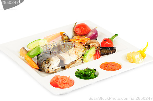 Image of fried wish with grilled vegetables and sauces