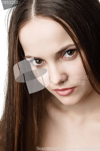 Image of young beautiful brown eyed woman