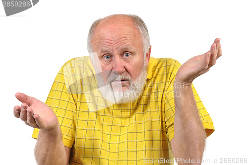 Image of senior bald man gestures disturbance