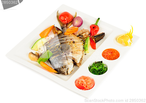 Image of fried wish with grilled vegetables and sauces