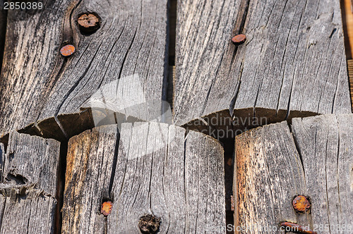 Image of cracked aged wooden boards