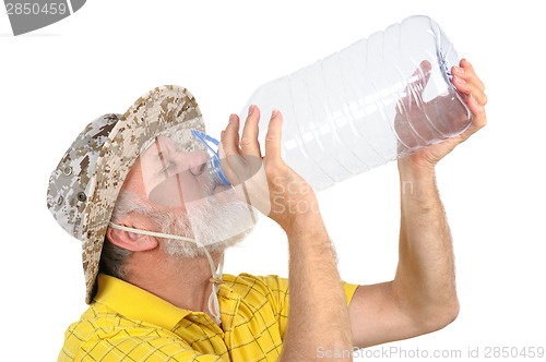 Image of senior man looking into empty bottle