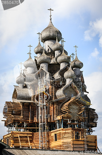 Image of Wooden church at Kizhi under reconstruction