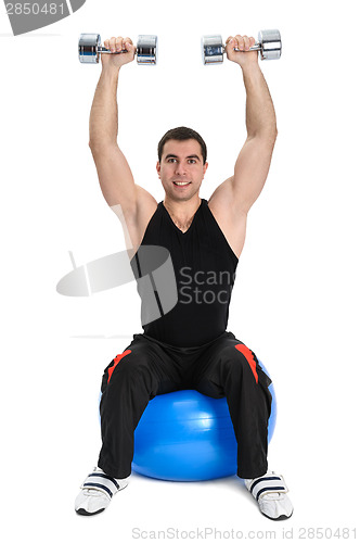 Image of Dumbbell Shoulder Press on stability ball