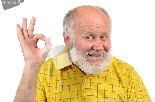 Image of senior bald man's gestures