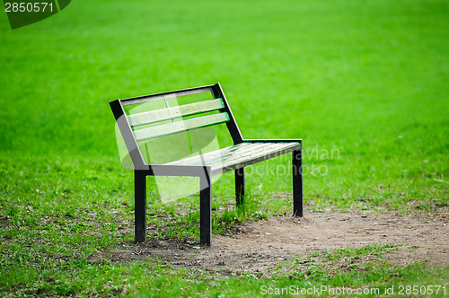 Image of Lonely broken bench in the park