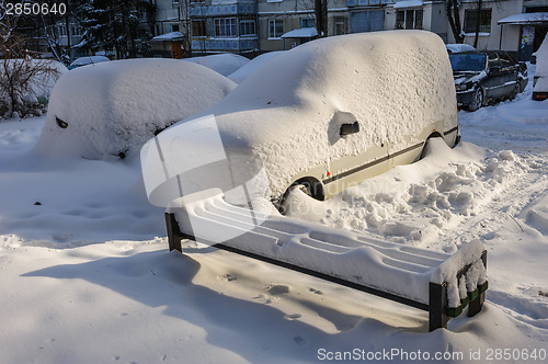 Image of Cars covered with snow