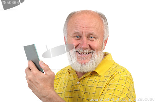 Image of smiling senior bald man with mirror