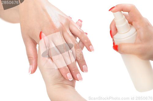 Image of manicure applying - moisturising