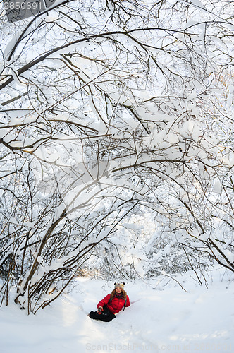 Image of young girl playing in snow