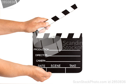 Image of Hands holding clapperboard