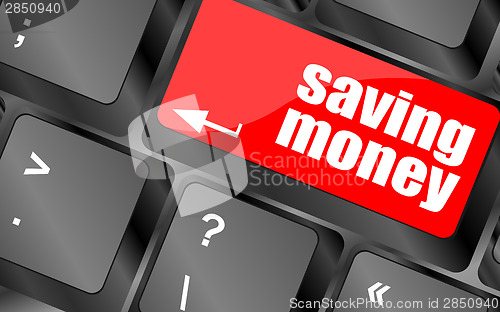 Image of saving money for investment with a button on computer keyboard