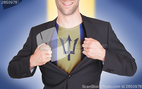 Image of Businessman opening suit to reveal shirt with flag