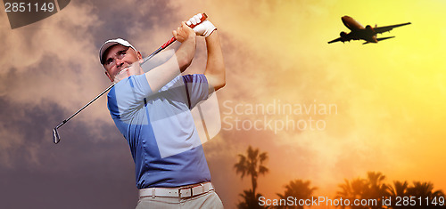 Image of golfer shooting a golf ball