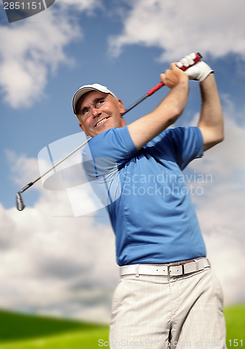 Image of 	golfer shooting a golf ball