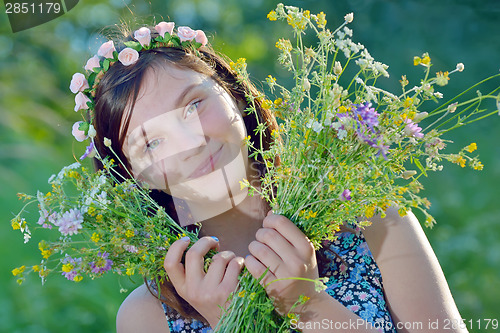 Image of beautiful girl with Bouquet of Flowers