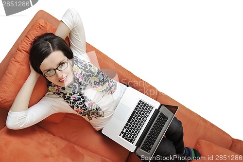 Image of woman using a laptop computer at home