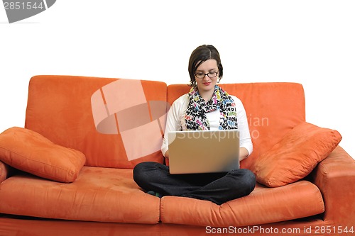 Image of woman using a laptop computer at home