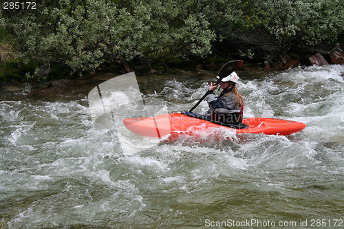 Image of Woman doing river rafting