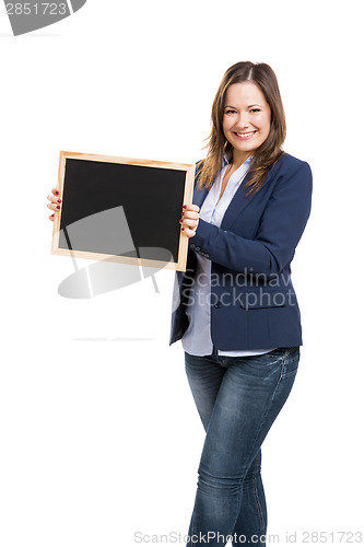 Image of Business woman holding a shalkboard