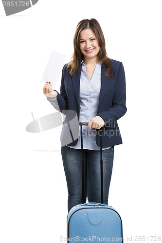 Image of Business woman carrying a suitcase