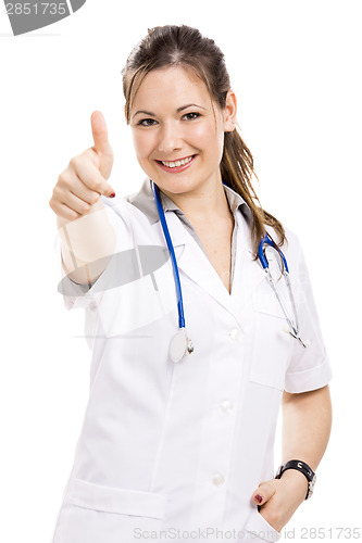 Image of Beautiful young veterinary with thumbs up, isolated over white b