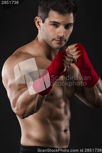 Image of Man practicing body combat