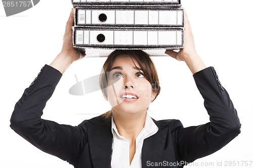 Image of Business woman carying folders