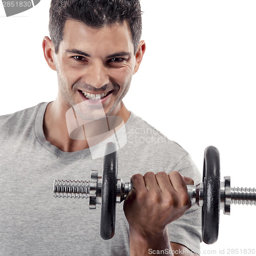 Image of Athletic man lifting weights