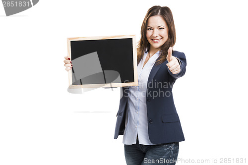 Image of Business woman holding a chalkboard