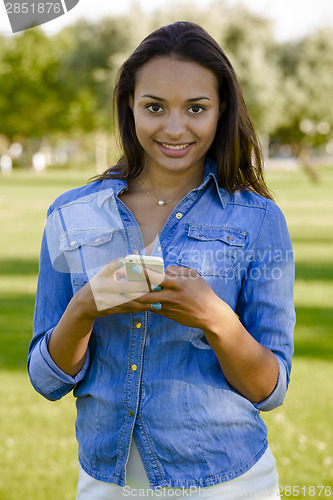 Image of Beautiful woman talking at phone