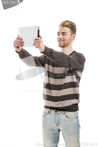 Image of Young man taking a selfie 