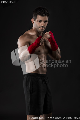 Image of Man practicing body combat