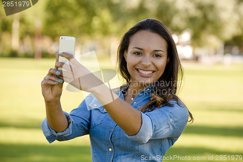 Image of Beautiful woman talking at phone