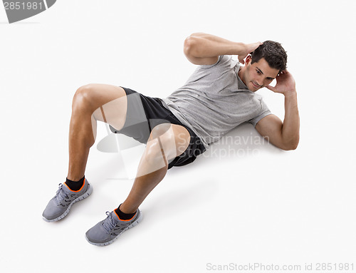 Image of Man doing abdominals