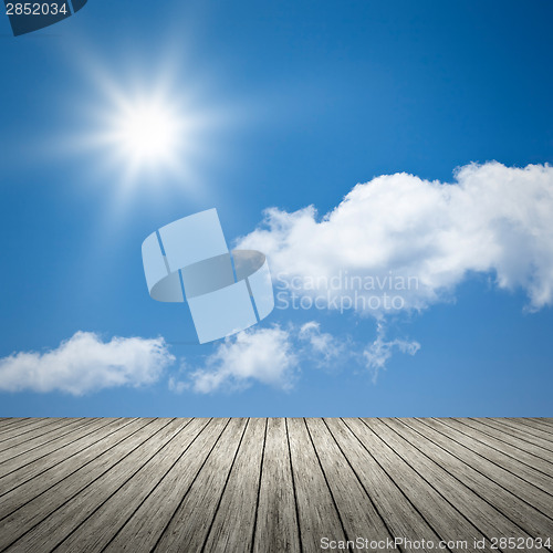 Image of bright sun blue sky background