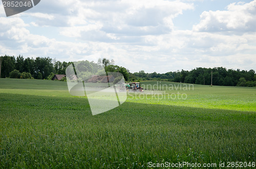 Image of chemical treatment spray pesticide on field 