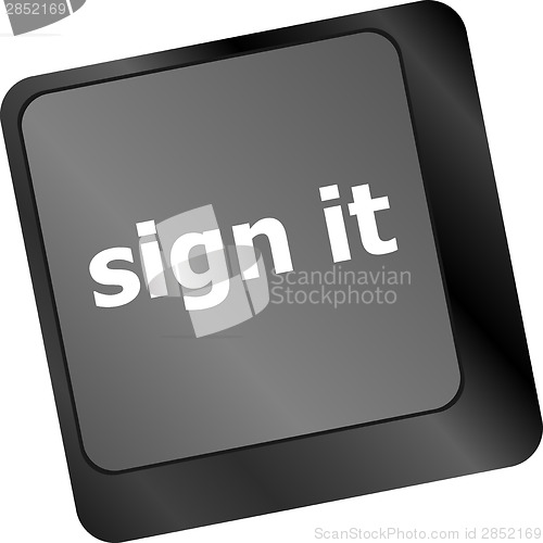 Image of sign it or login concept with key on computer keyboard