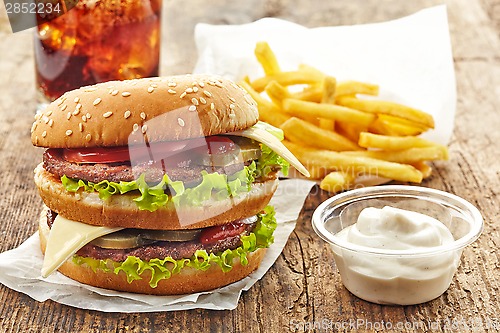 Image of big hamburger and french fries
