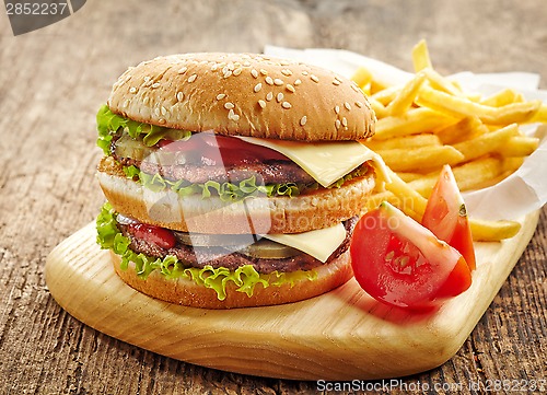 Image of big hamburger and french fries